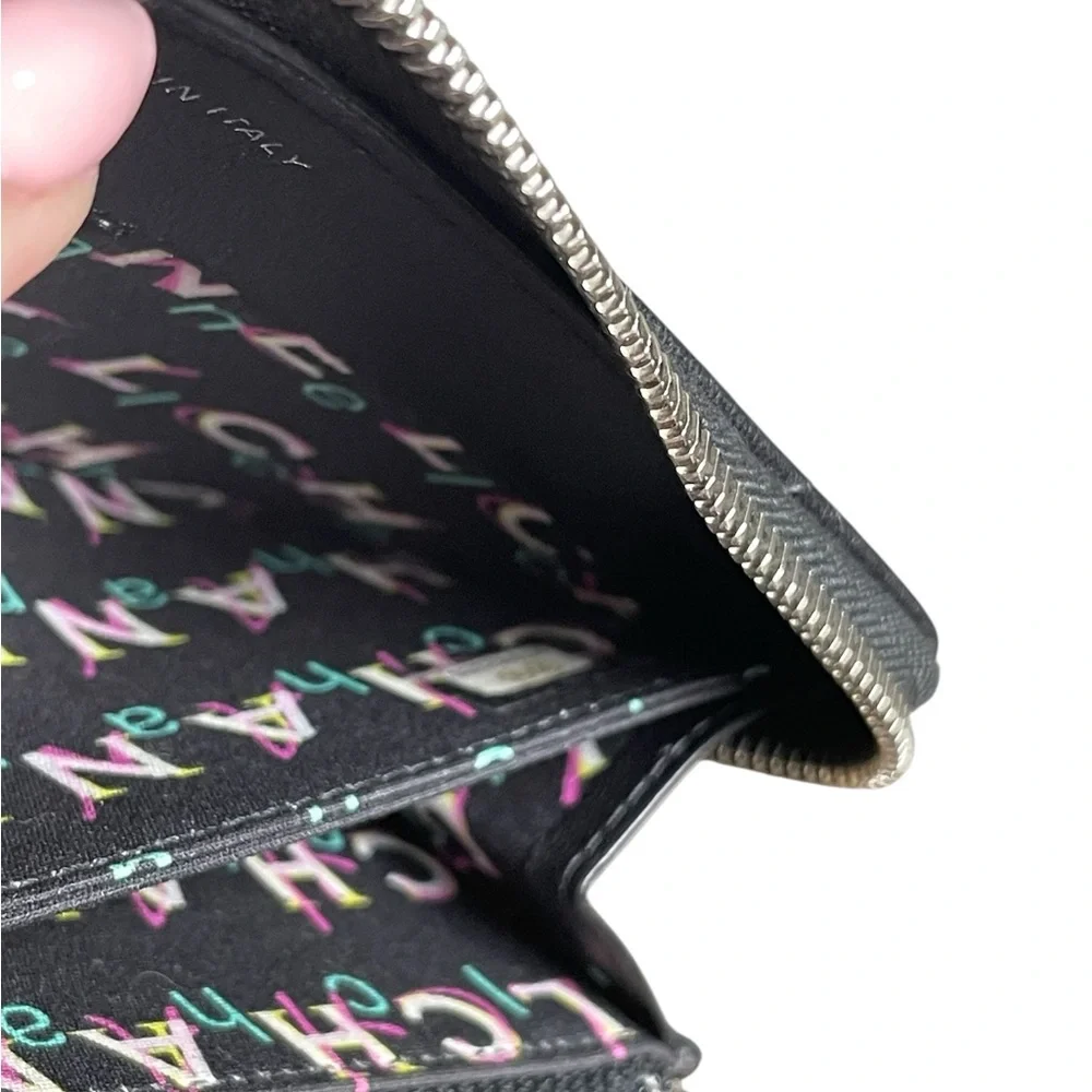CHANEL Black Quilted Zip Wallet with CC Logo